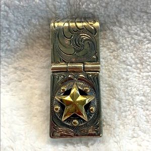 Silver and gold money clip from Maida’s